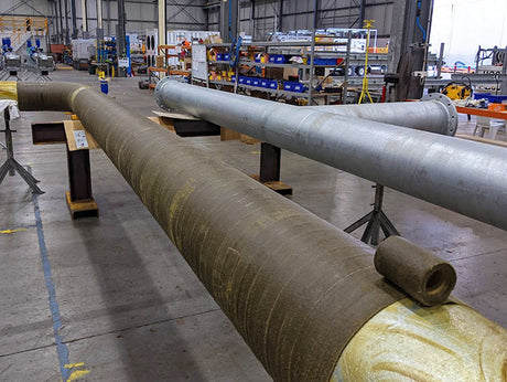 Steel pipes spirally wrapped in Denso Tape petrolatum tape for corrosion protection
